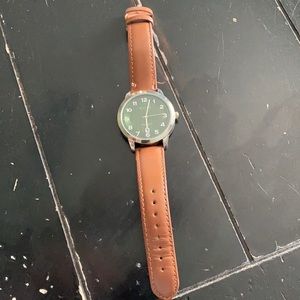 Green watch with brown band